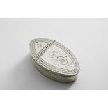 A GEORGE III IRISH BRIGHT-ENGRAVED SNUFF BOX navette-shaped, with pricked borders, the cartouche