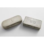 A VICTORIAN SILVER ENGINE-TURNED SNUFF BOX with rounded ends, the cartouche with an engraved crest &