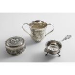 AN EARLY GEORGE III PORRINGER with a campana-shaped body decorated with wrythen fluting and a