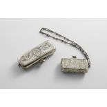 AN EARLY 20TH CENTURY NORTH AMERICAN SILVER COIN HOLDER rectangular with engraving & a script