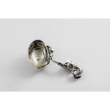 A VICTORIAN SCOTTISH CAST NATURALISTIC CADDY SPOON with a bowl resembling a shell and a curved