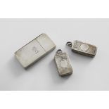 A VICTORIAN SMALL EARLY SILVER VESTA CASE rectangular with engine-turning & a gilt interior, by