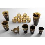 EIGHT SCOTTISH MOUNTED HORN "SOUVENIR" NAPKIN RINGS (Five with the maker's mark of W. Dunningham &