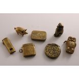 SEVEN VARIOUS LATE 19TH / EARLY 20TH CENTURY BRASS VESTA CASES to include a dog, a pig, an owl, a