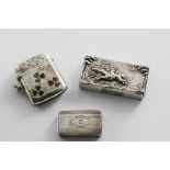 A LATE VICTORIAN SILVER RECTANGULAR VESTA CASE with a horse-racing scene in relief on the front &