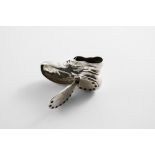 A LATE 19TH CENTURY SILVER NOVELTY VESTA CASE in the form of a mis-shapen hobnail boot with a