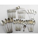 A MIXED LOT OF FLATWARE:- Various dates & makers, the majority George III - Victorian period to