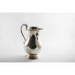 A LATE 20TH CENTURY BEER JUG inscribed under the foot "Replica of a George II Beer Jug, London 1753,