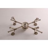 A GEORGE III ADJUSTABLE DISH CROSS with pierced feet and supports and a central burner, probably