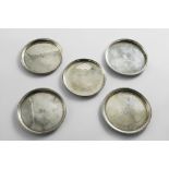 FIVE GEORGE III IRISH PLAIN CIRCULAR COUNTER TRAYS (two crested & two initialled), all by William