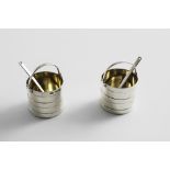 A PAIR OF VICTORIAN NOVELTY SALTS in the form of wooden cream pails with swing handles, gilt