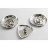 TWO EARLY 20TH CENTURY CIRCULAR PIN DISHES One embossed with the portrait of a mastif, by