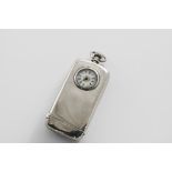 A VICTORIAN SILVER VESTA CASE, SOVEREIGN CASE & TIMEPIECE COMBINED of rounded rectangular outline,