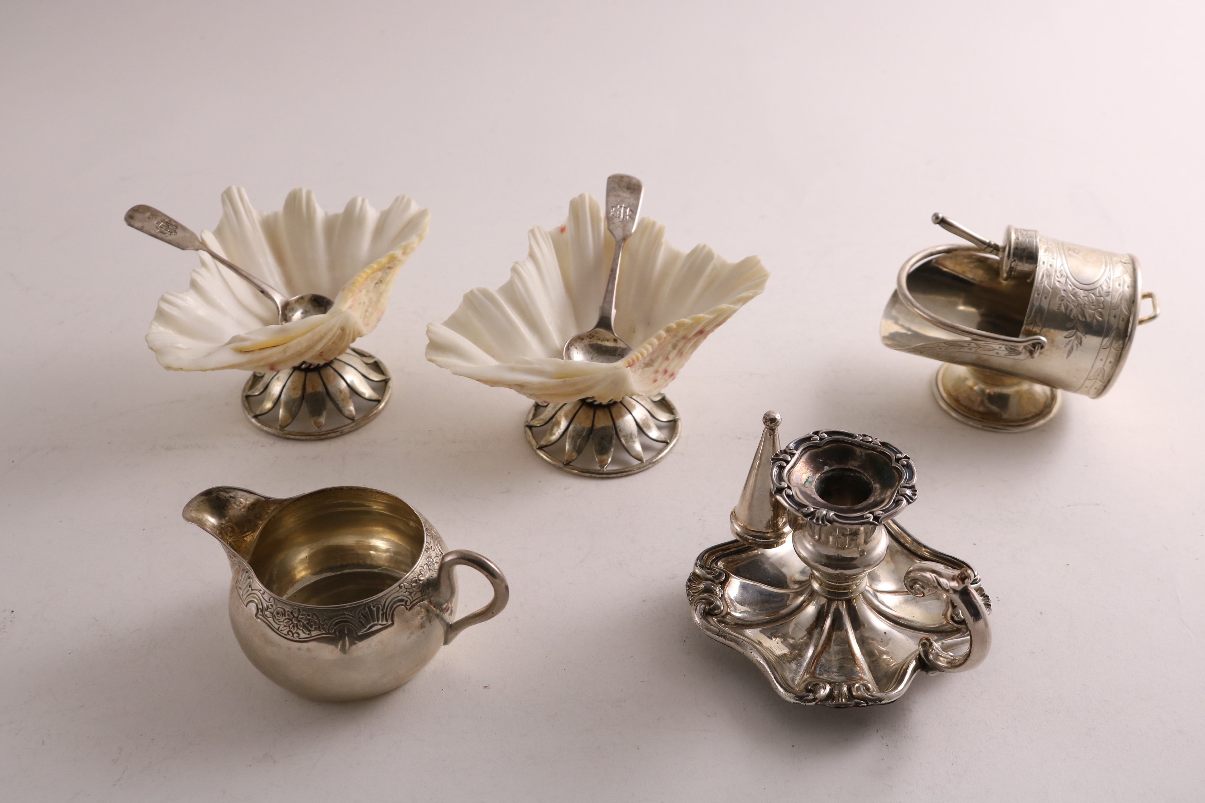 A PAIR OF VICTORIAN SILVER-MOUNTED NATURAL SHELL SALTS probably by Walter Read, London 1868, a