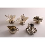 A PAIR OF VICTORIAN SILVER-MOUNTED NATURAL SHELL SALTS probably by Walter Read, London 1868, a