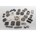 TWELVE PAIRS OF 19TH CENTURY CUT-STEEL BUCKLES A gun-metal buckle, a pair of steel buckles, an agate