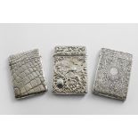 AN EDWARDIAN SILVER CARD CASE with simulated crocodile-skin texturing, by W. H. Sparrow,