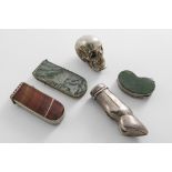 A LATE 19TH CENTURY PLATED BRASS SKULL VESTA CASE a plated hind's foot vesta case, c.1900, two