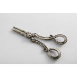 A PAIR OF EARLY 20TH CENTURY HANDMADE CAST GRAPE SHEARS with a flowerhead boss on the pivot and