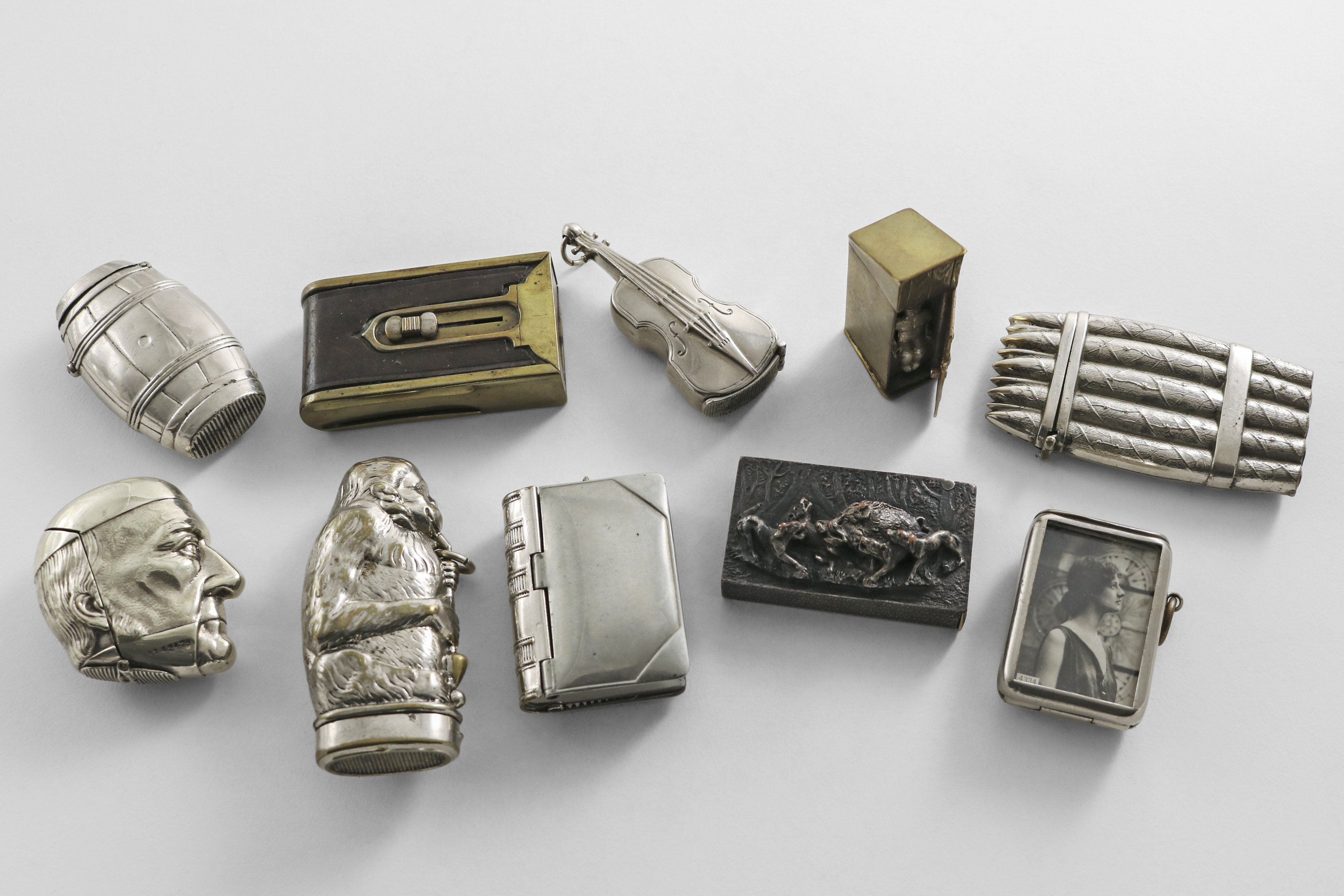 AN ASSORTMENT OF TEN LATE 19TH / EARLY 20TH CENTURY FIGURAL AND OTHER VESTAS in nickel-plate,