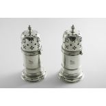 A PAIR OF LATE VICTORIAN "LIGHTHOUSE" SUGAR CASTERS in the style of William & Mary examples with