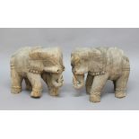 PAIR OF INDIAN WOODEN ELEPHANTS, with carved, ceremonial decoration, length 50cm