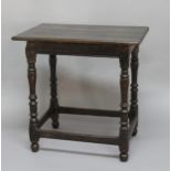 OAK SIDE TABLE, late 17th century, the rectangular top on turned supports and box stretchers, height