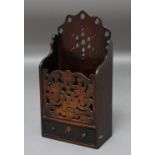 MAHOGANY AND WALNUT CANDLEBOX, late 18th or erly 19th century, the fretwork front above a single