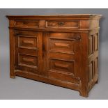 OAK SIDE CUPBOARD, possibly 17th century, a pair of doors above a pair of double panelled doors,