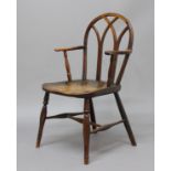 YEW AND ELM GOTHIC WINDSOR STYLE KITCHEN CHAIR, 19th century, with arched back, outswept arms, solid