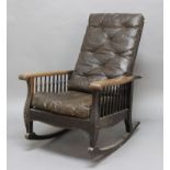 OAK ARTS AND CRAFTS 'MORRIS' ROCKING CHAIR, in the manner of Gustav Stickley, with reclining, ladder