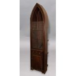 MAHOGANY LANCET SHAPED BOOKCASE SECTION, early or mid 19th century, with astragal glazing above a
