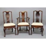 EIGHT QUEEN ANNE STYLE WALNUT DINING CHAIRS, the shaped splats above drop in seats, cabriole front