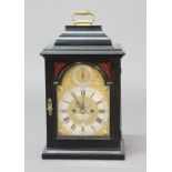 GEORGE III EBONISED BRACKET CLOCK, the brass dial with a 6 1/2" silvered chapter ring and plaque