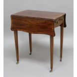 REGENCY MAHOGANY PEMBROKE TABLE, of serpentine form, the shaped top above a single drawer on