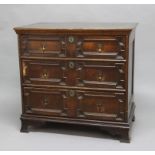 JACOBEAN STYLE OAK CHEST OF DRAWERS, late 17th or 18th century, the three moulded drawers with brass
