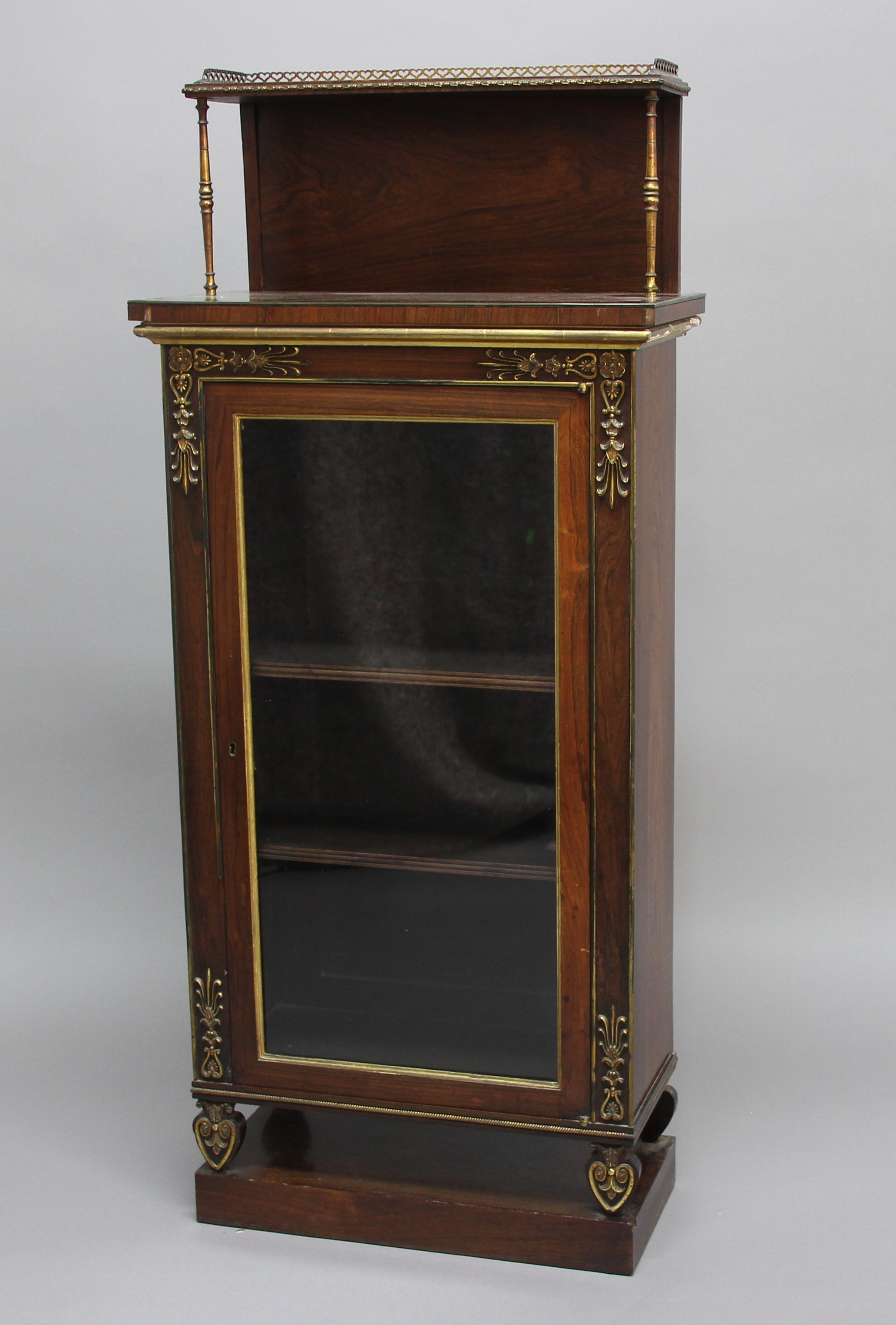 19TH CENTURY ROSEWOOD PIER CABINET, in the manner of George Bullock, with brass gallery and