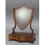 GEORGE III MAHOGANY AND INLAID TOILET MIRROR, the shield shaped mirror on scrolling supports, the