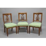 SET OF TWELVE REGENCY WALNUT DINING CHAIRS, the square back with lyre shaped splat,
