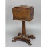 VICTORIAN ROSEWOOD TEAPOY, the sarcophagus top with fitted interior on a turned column and