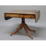 REGENCY MAHOGANY SOFA TABLE, with two true and two false drawers on a turned column and outswept
