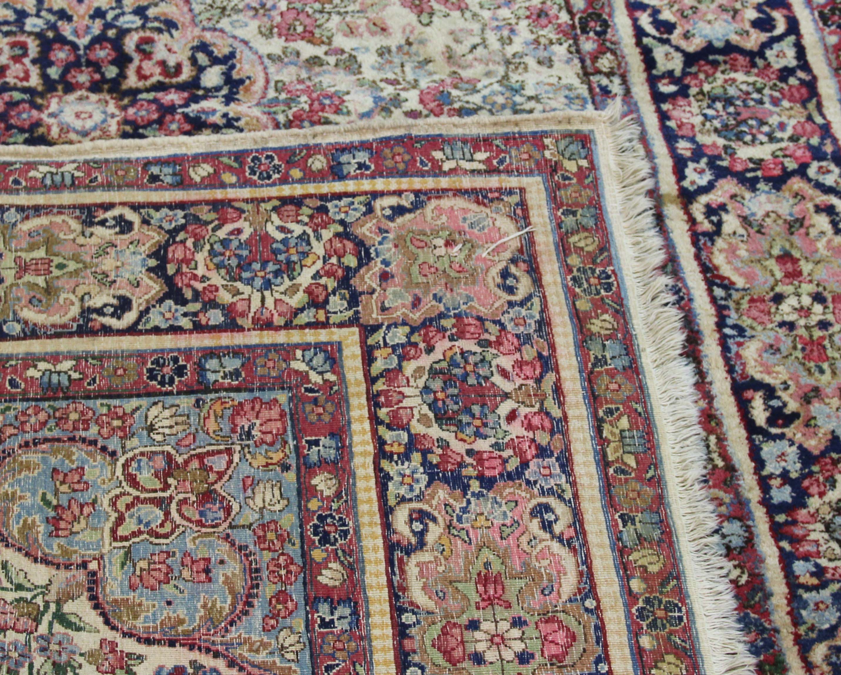 KIRMAN CARPET, South East Iran, circa 1940, woven as one piece in the format of rugs, each with an - Image 2 of 2