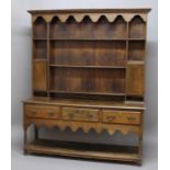 OAK DRESSER, 18th century, the plate rack with three shelves, two cupboards and two small drawers on
