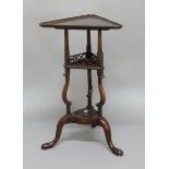 19TH CENTURY MAHOGANY LAMP TABLE, the triangular top above pierced gallery and scrolling supports,