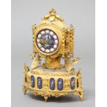 FRENCH GILT METAL AND PORCELAIN MANTEL CLOCK, the 3 3/4" porcelain dial inscribed Le Roy & Fils,