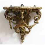 GILTWOOD WALL BRACKET, with scrolling foliate decoration, height 30cm