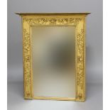GILT OVERMANTEL MIRROR, of rectangular form, the frame with scrolling foliate decoration, height