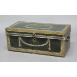 GEORGE III LEATHER AND BRASS BOUND TRUNK, with brass studded decoration, the interior with paper