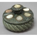 GRAND TOUR INTEREST: A Green serpentine inkwell mounted with seven larva and hardstone cameo