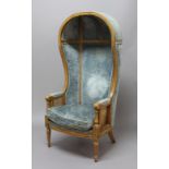 WALNUT PORTERS CHAIR, 20th century, with a padded back, bergere arms, the label reading 'Custom Made